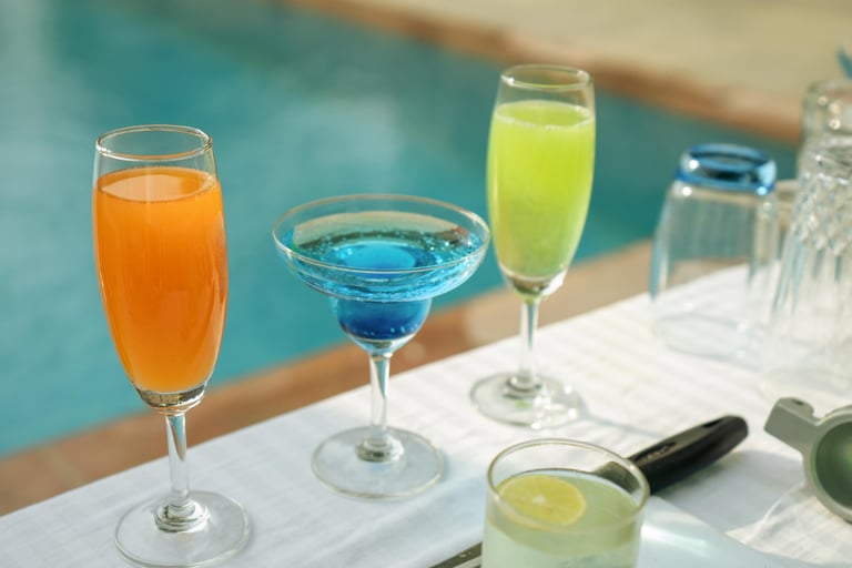 Poolside cocktails at golden hour
